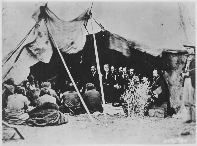 photograph_of_general_william_t-_sherman_and_commissioners_in_council_with_indian_chiefs_at_fort_laramie_wyoming_ca-_1_-_nara_-_531079